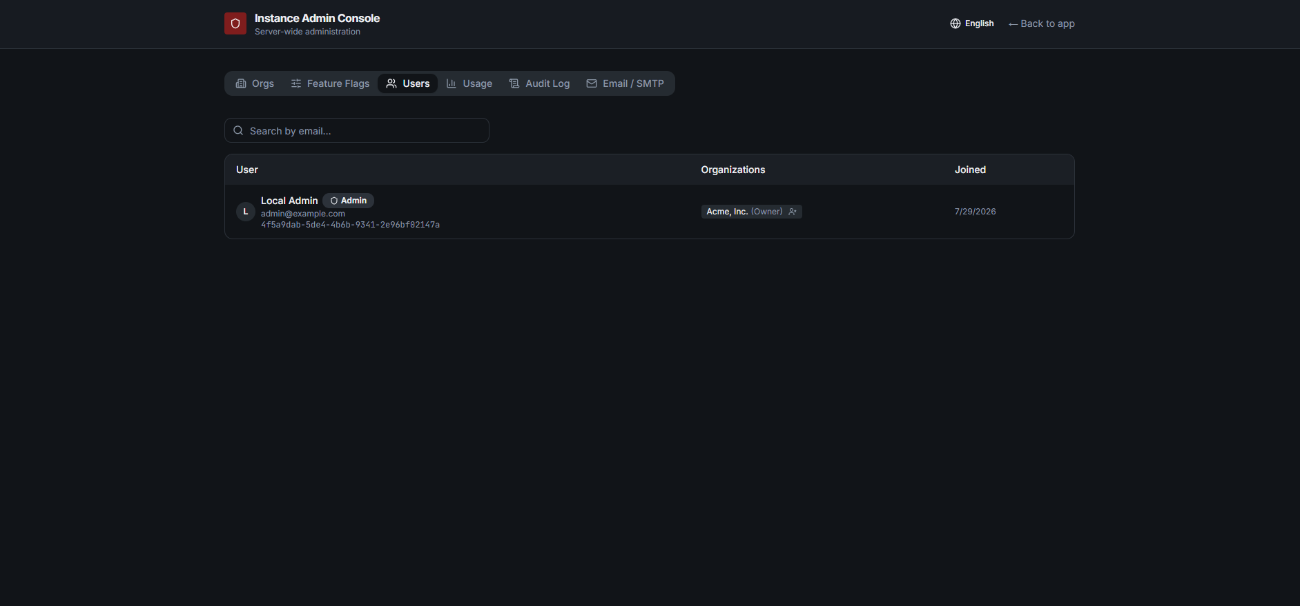 Opsly instance admin Users tab in dark mode listing users, their organizations and roles, and join dates